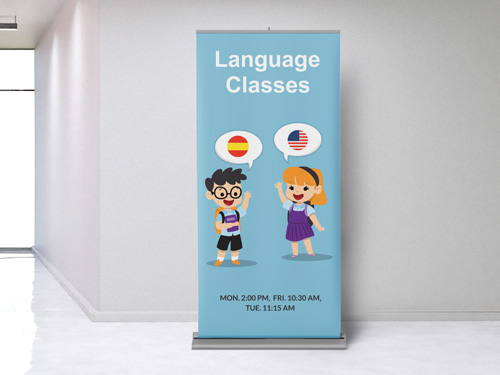 A retractable banner with blue graphics advertising foreign language classes.