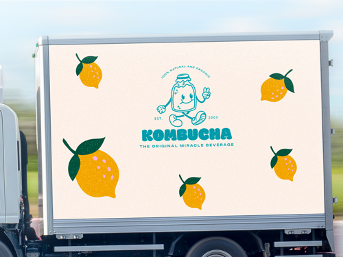 Food trailer decal featuring a cartoon kombucha character and lemons.
