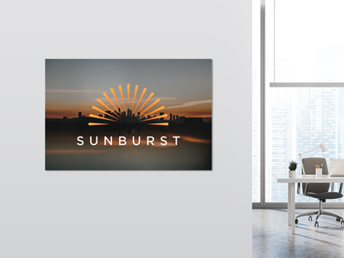 Metal photo print for offices featuring a sunset image and the Sunburst brand name.