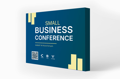 Blue and yellow pop up banner reading Small Business Conference.