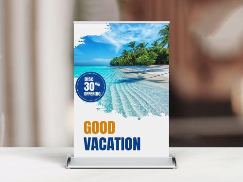 Check-in tabletop retractable banner showing seashore sale and vacation offer message.