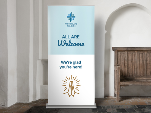 A retractable banner showcasing a church welcoming message.