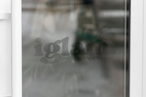 Clear vinyl lettering featuring the brand name on the storefront.
