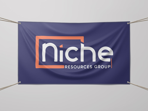 Blue fabric banner with white and orange logo text for Niche Resources Group, displayed with rope at each corner
