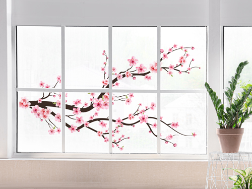 Artistic window decal showing cherry blossom branch with small potted plant beside it