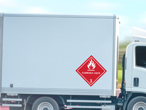 Red trailer decal indicating flammable liquid class 3 materials.