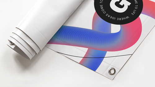 X-stand banner material partially unfurled, revealing texture and vibrant print detail.
