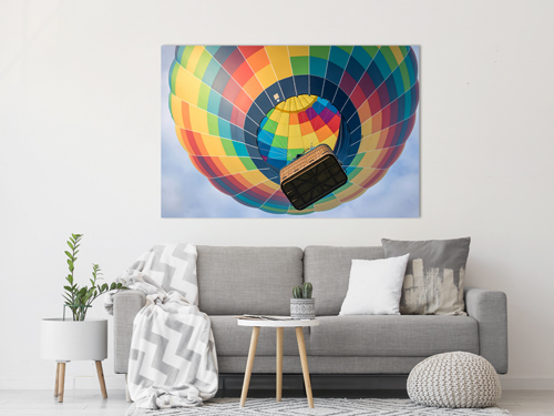 Metal photo print of a balloon displayed in a modern home.