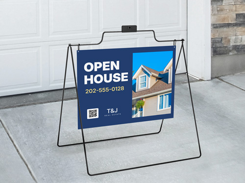 Real estate A-frame sign with Open House text, phone number, and house photo in front yard.