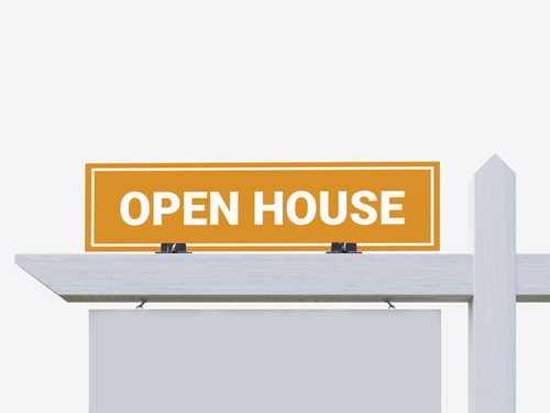A single real estate rider sign reading Open House mounted on a metal frame outdoors