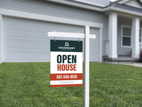 White real estate sign post displaying "Open House" on residential lawn.