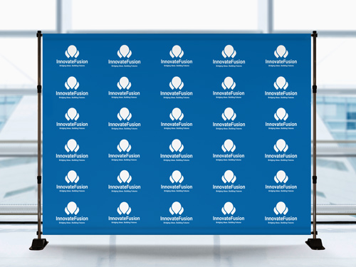 Step and repeat photo backdrop on a blue background featuring logo and brand name.