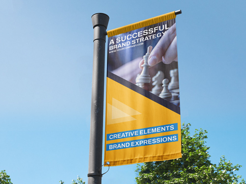 A vinyl flag attached to a pole with a branding message and fingers making a chess move.