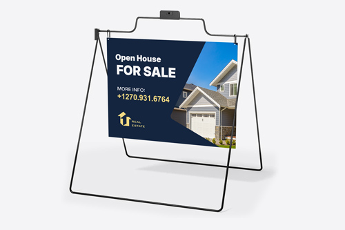 "Real estate A-frame sign displaying Open House For Sale with house photo.
