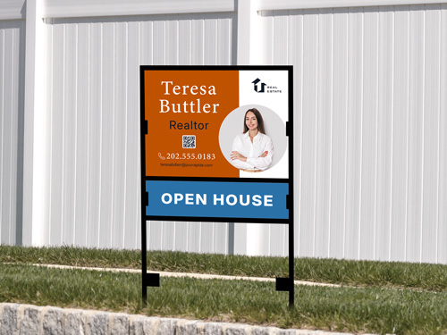 Real estate H-frame sign for Teresa Butler with photo and contact details.