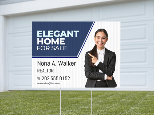 For sale A-frame sign featuring realtor John J. Bryden and contact details