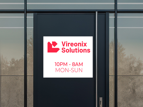 White Vireonix Solutions reflective decal with red logo and operating hours on a dark door.