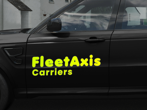 Reflective vehicle lettering on dark car door displaying company branding.