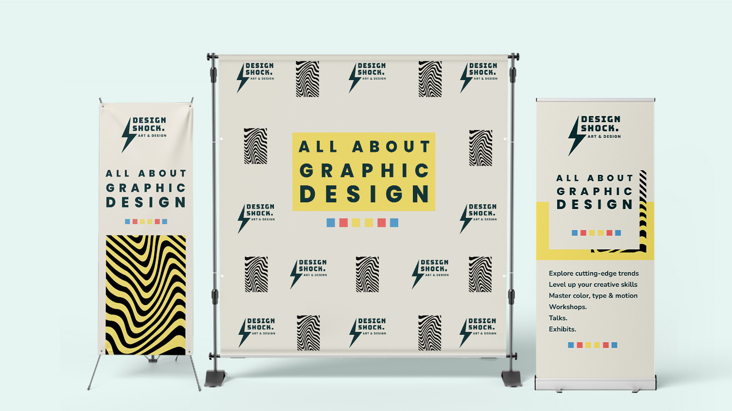 Exhibition standing banners featuring All About Graphic Design in black and yellow