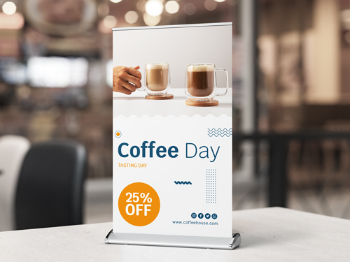 Tabletop retractable banner for cafes showing coffee cups and sale offer.