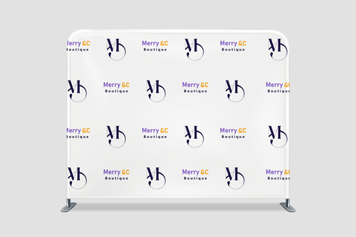 A tension fabric backdrop covered in two sets of logos.