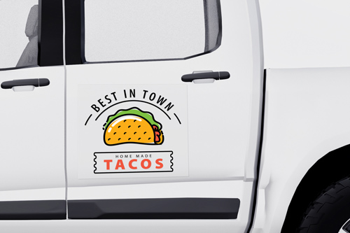 Best In Town Tacos truck decal displayed on the side door with bold, eye-catching design.